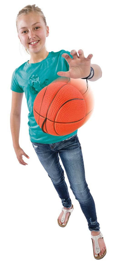 Person holding a basketball with a transparent background