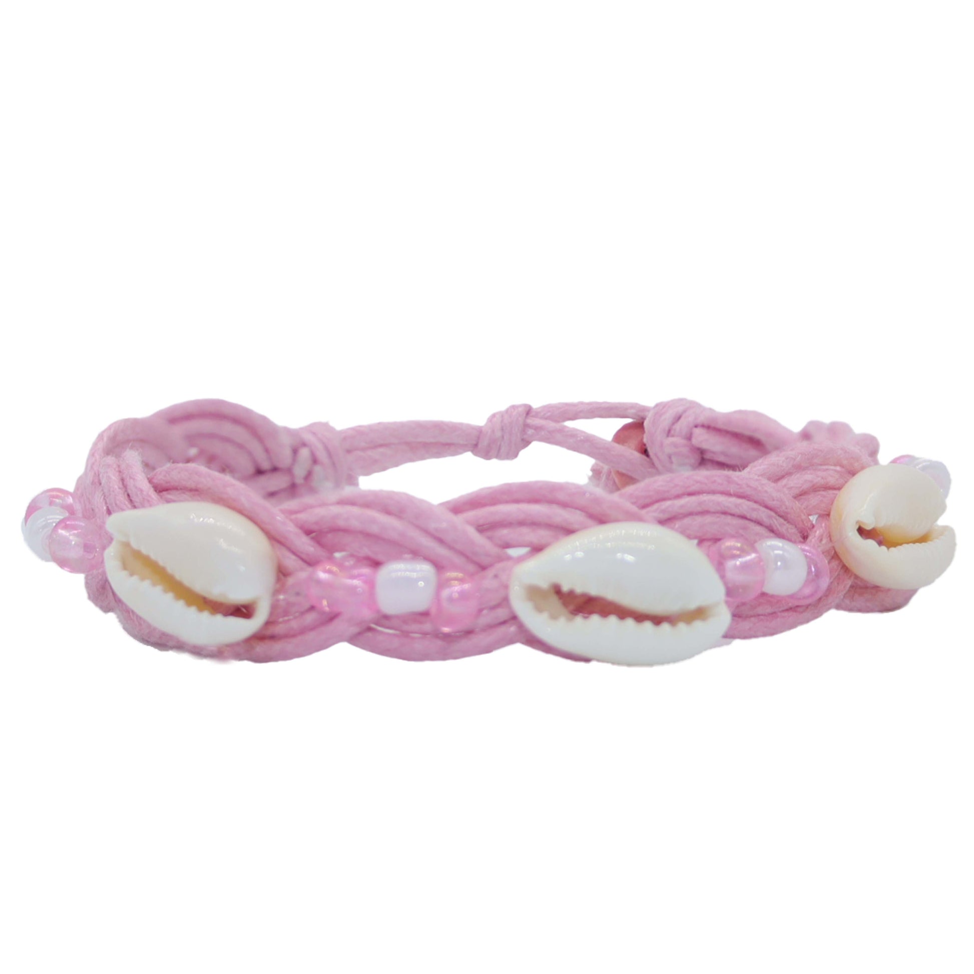 A pink braided cord bracelet decorated with three white cowrie shells and small white beads, shown against a plain white background.