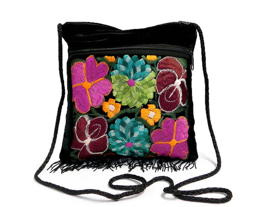 Black purse bag with colorful floral embroidery on a white background