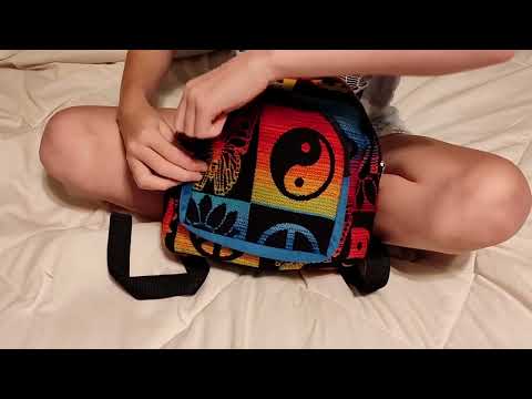 Showing the details of a colorful mini backpack