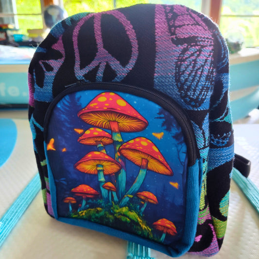 Colorful backpack with mushroom design and peace symbol on a paddleboard 